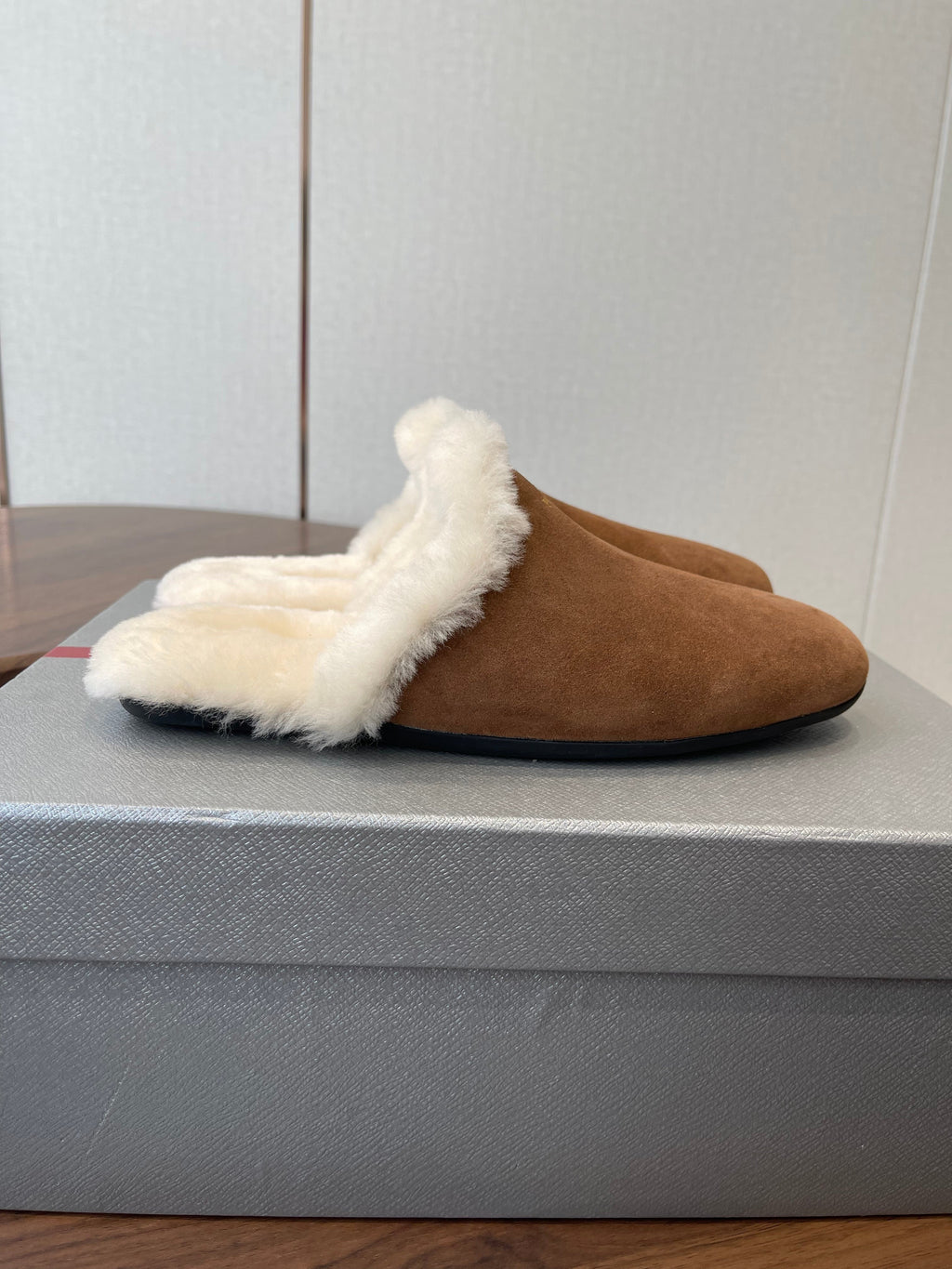 PRADA 25S CLOGS IN BROWN SUEDE FUR-LINED