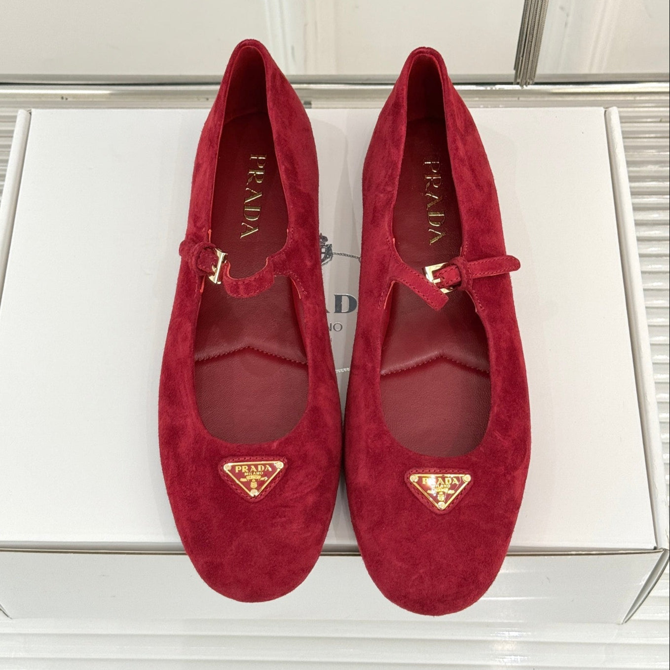 PRADA 25S SOFT PADDED BALLERINAS IN RK RED SUEDE