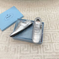 PRADA TASSEL LOAFERS IN SILVER METALLIC LAMBSKIN