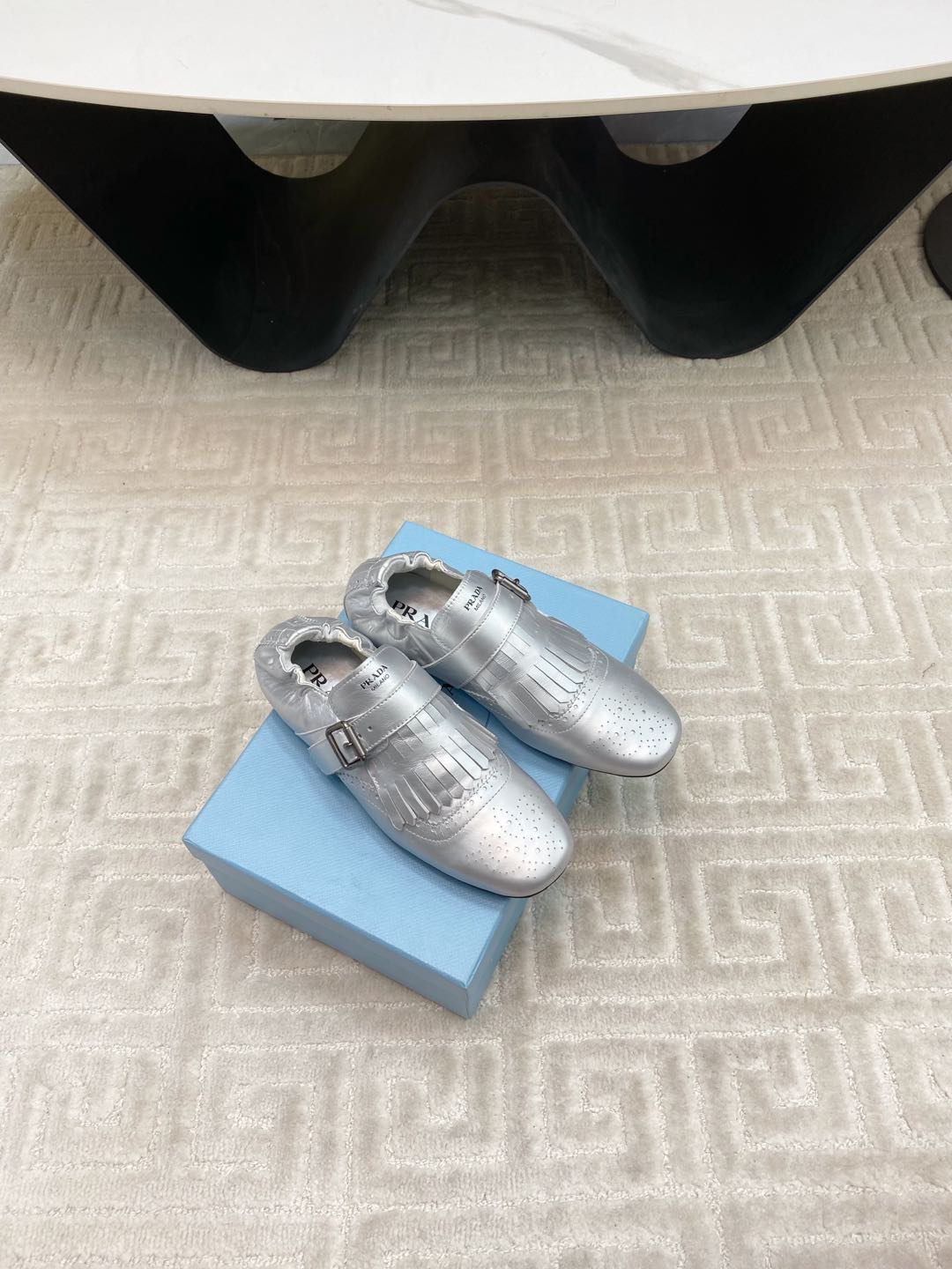 PRADA TASSEL LOAFERS IN SILVER METALLIC LAMBSKIN