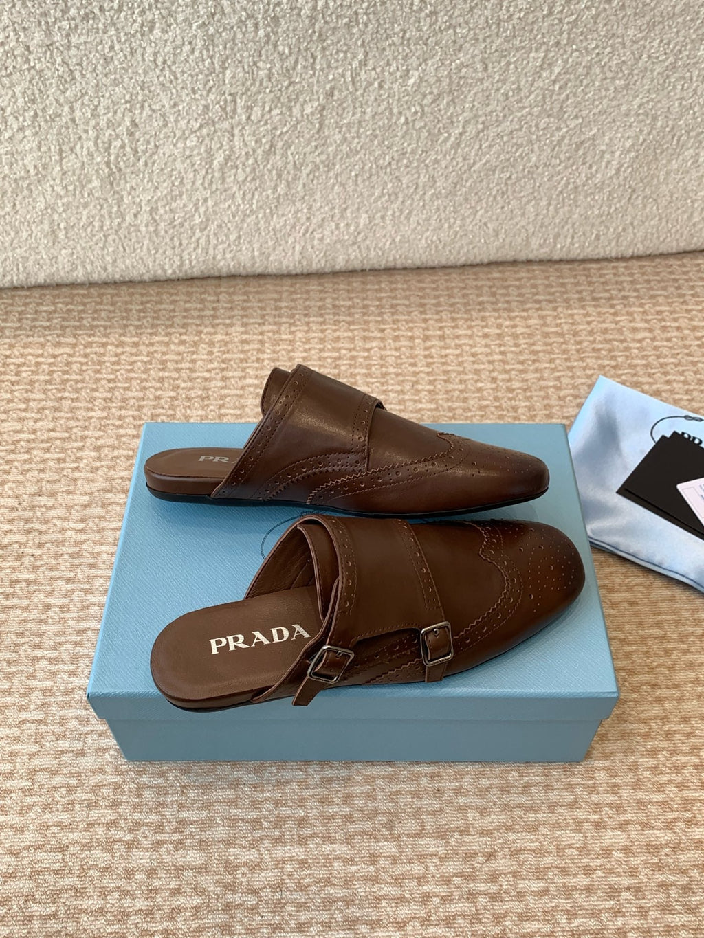 PRADA DOUBLE MONK MULES IN RK BROWN CALFSKIN