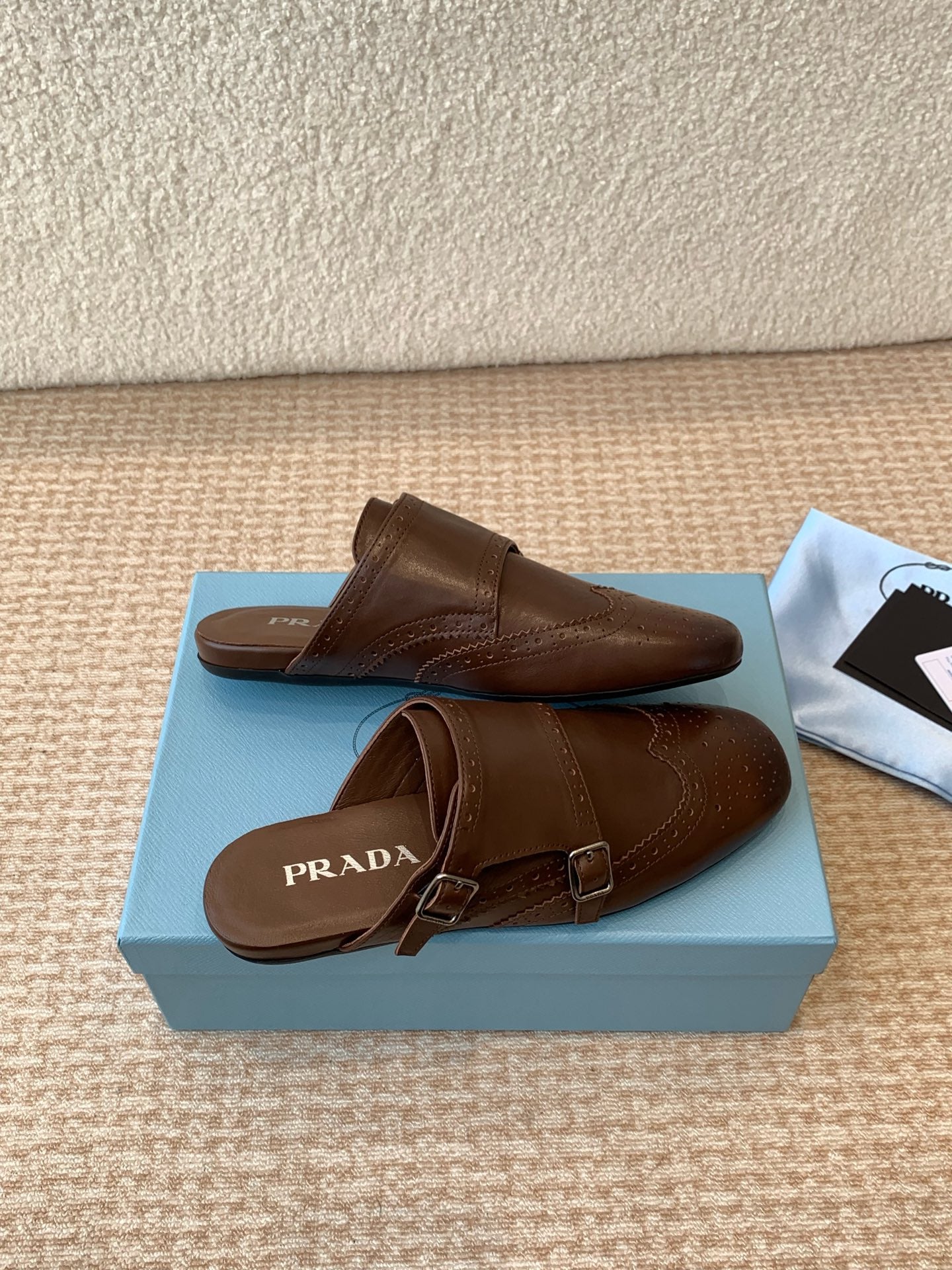 PRADA DOUBLE MONK MULES IN RK BROWN CALFSKIN